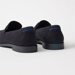 Close up of the heel of The Penny Loafer in ReVelvet Black. 