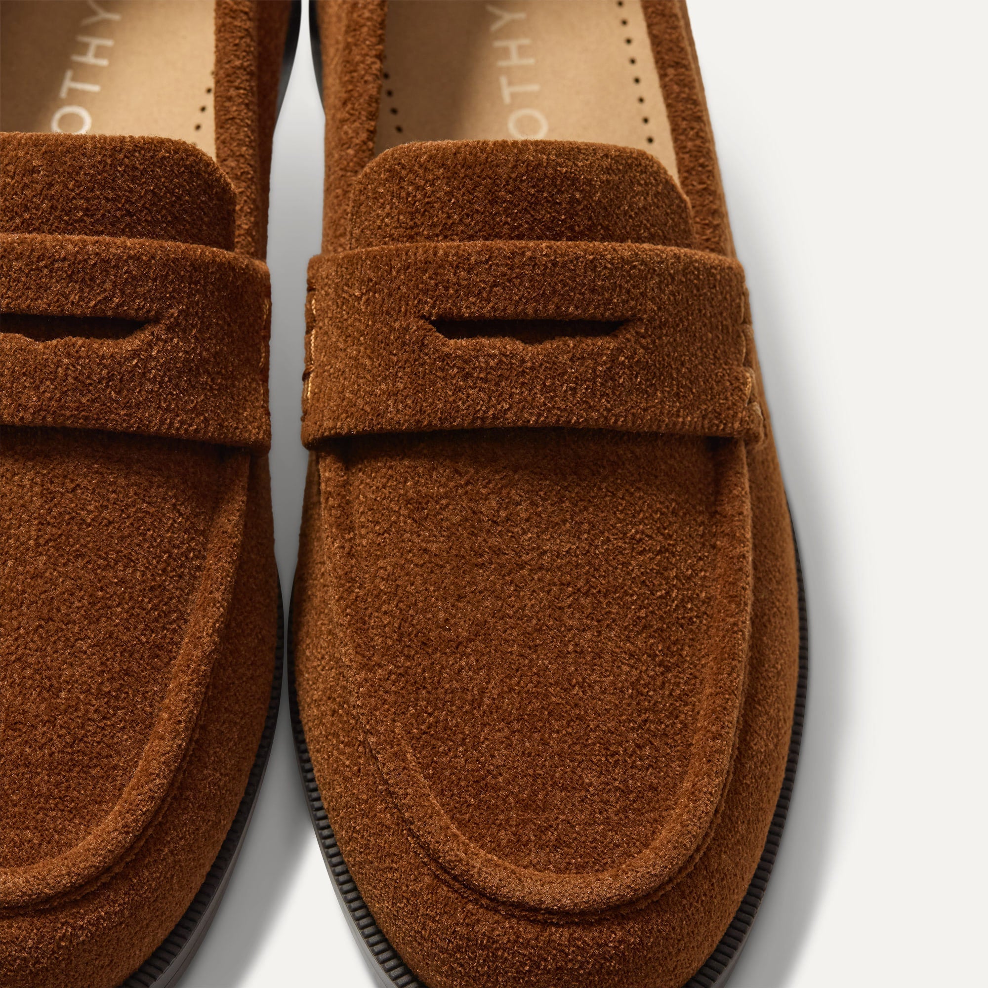 macro | Close up of the toe box and penny keeper of The Penny Loafer in ReVelvet Russet.