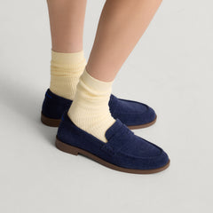 hover | Model wearing The Penny Loafer in ReVelvet Navy. 