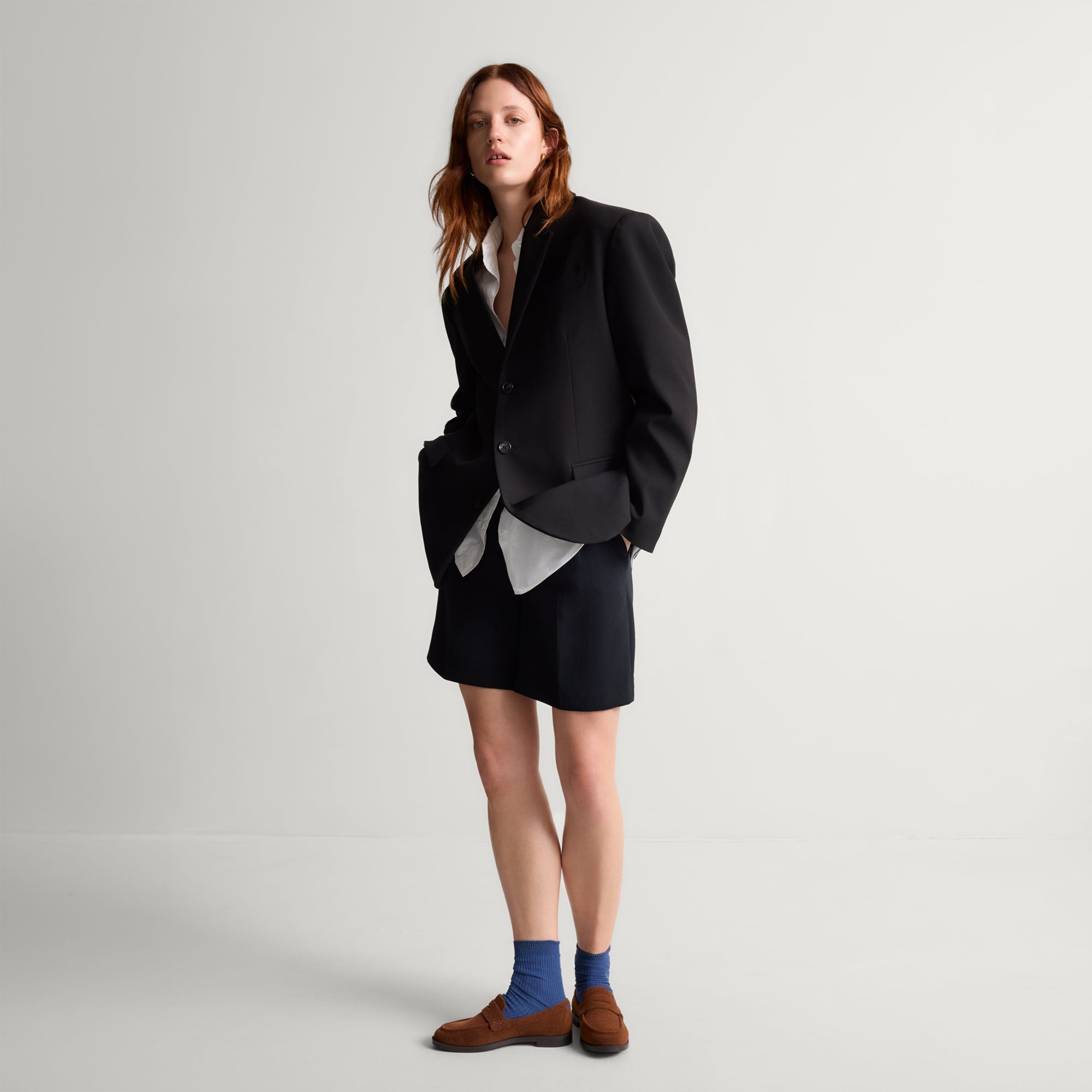 model | Alternate view of a model wearing The Penny Loafer in ReVelvet Russet. 