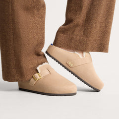 hover | Model wearing The Teddy Buckle Clog in Honey.