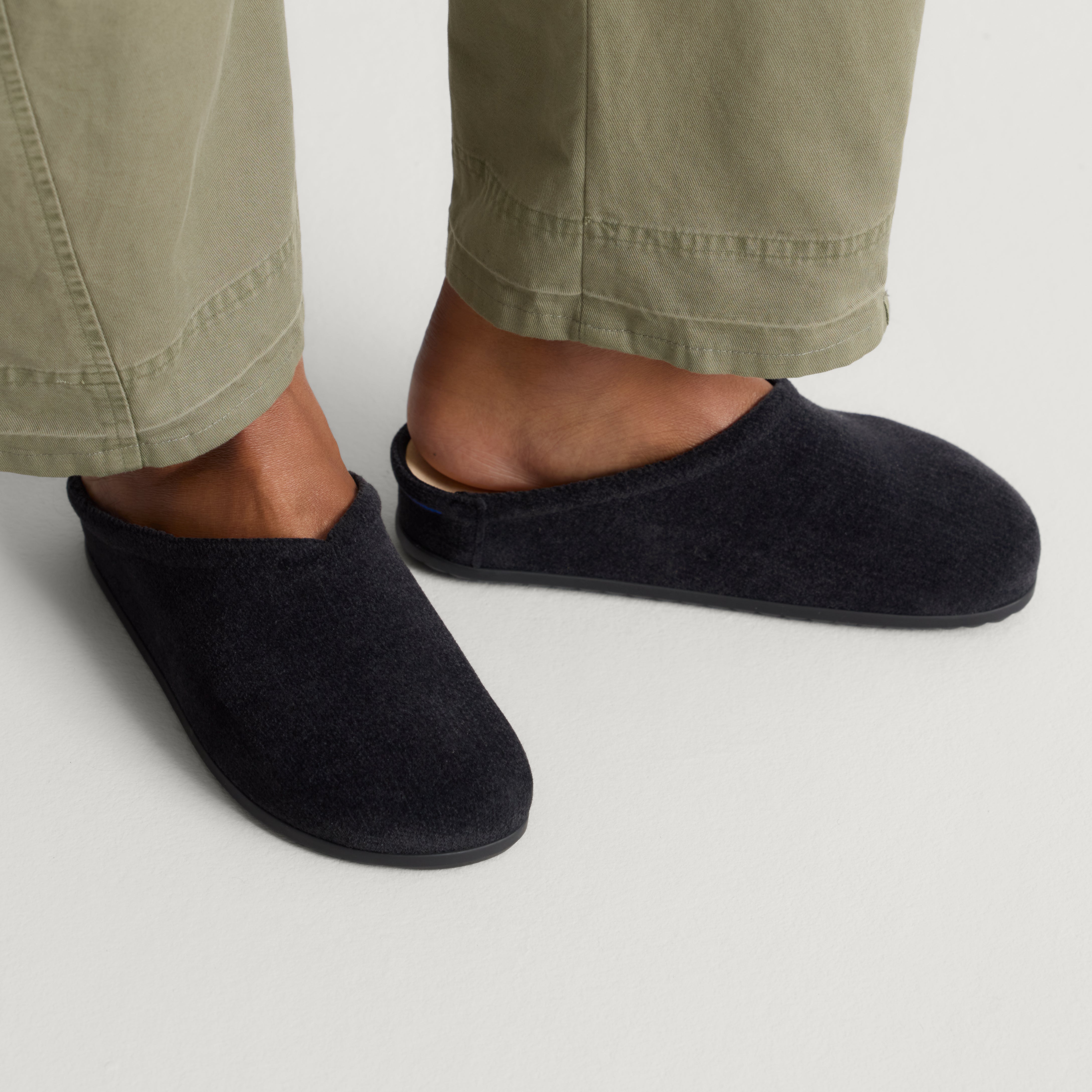 hover | Model wearing The Casual Clog in ReVelvet™ Black.