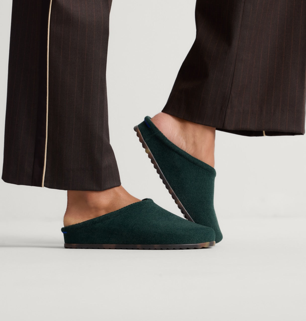 hover | Model wearing The Casual Clog in ReVelvet™ Pine.