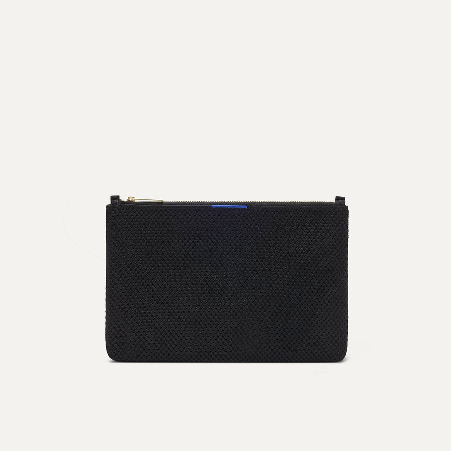 PLP |The Convertible Clutch in Black Espresso Open-Knit, shown from the front.