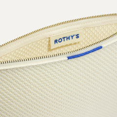 The Convertible Clutch in Love Bird Open-Knit, shown open from the top in diagonal view.