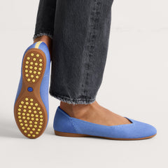 hover | Model wearing The Daily Flat in Clear Blue. 