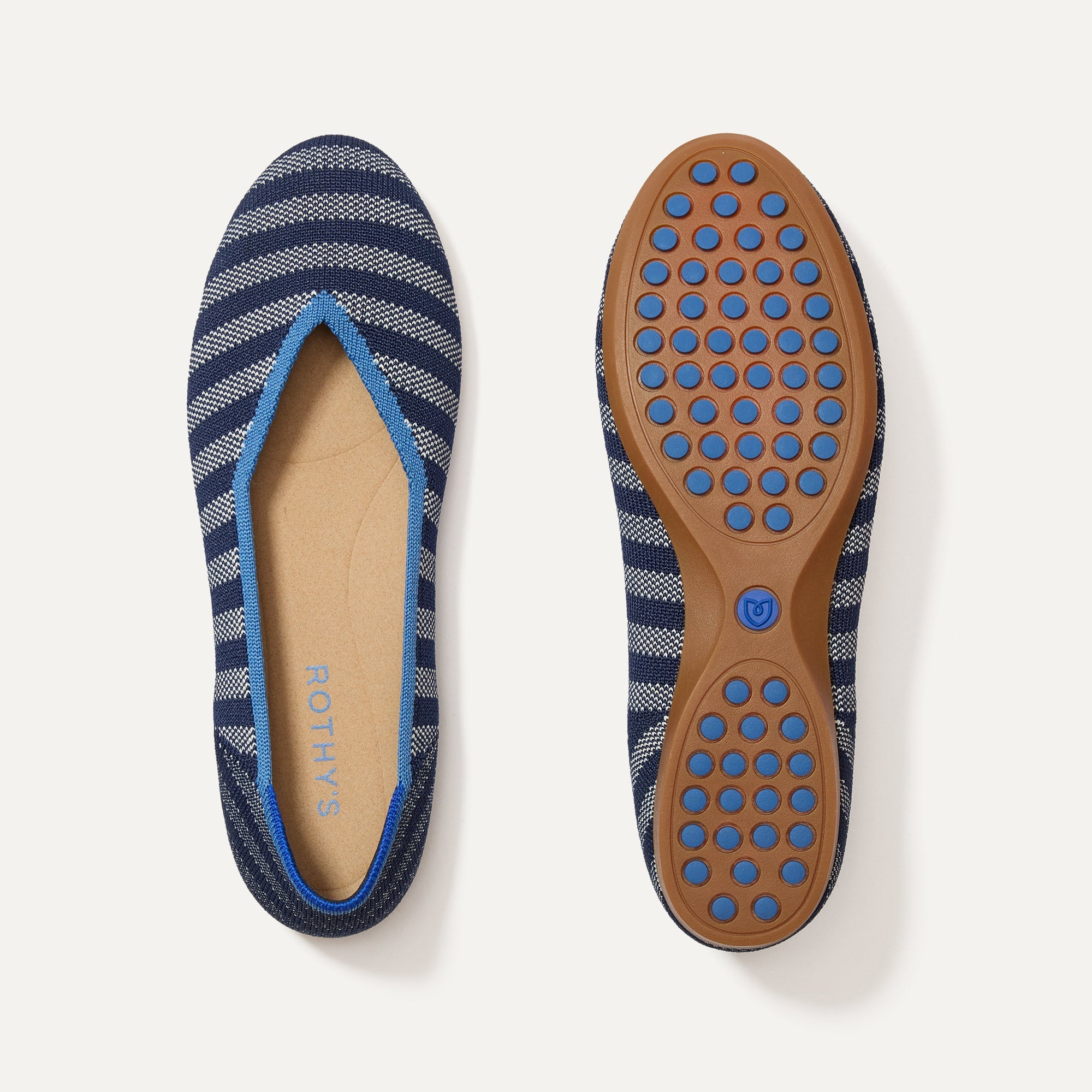 PLP |The Daily Flat in Harbor Cabana Stripe shown from the top with one shoe showing the outsole. 