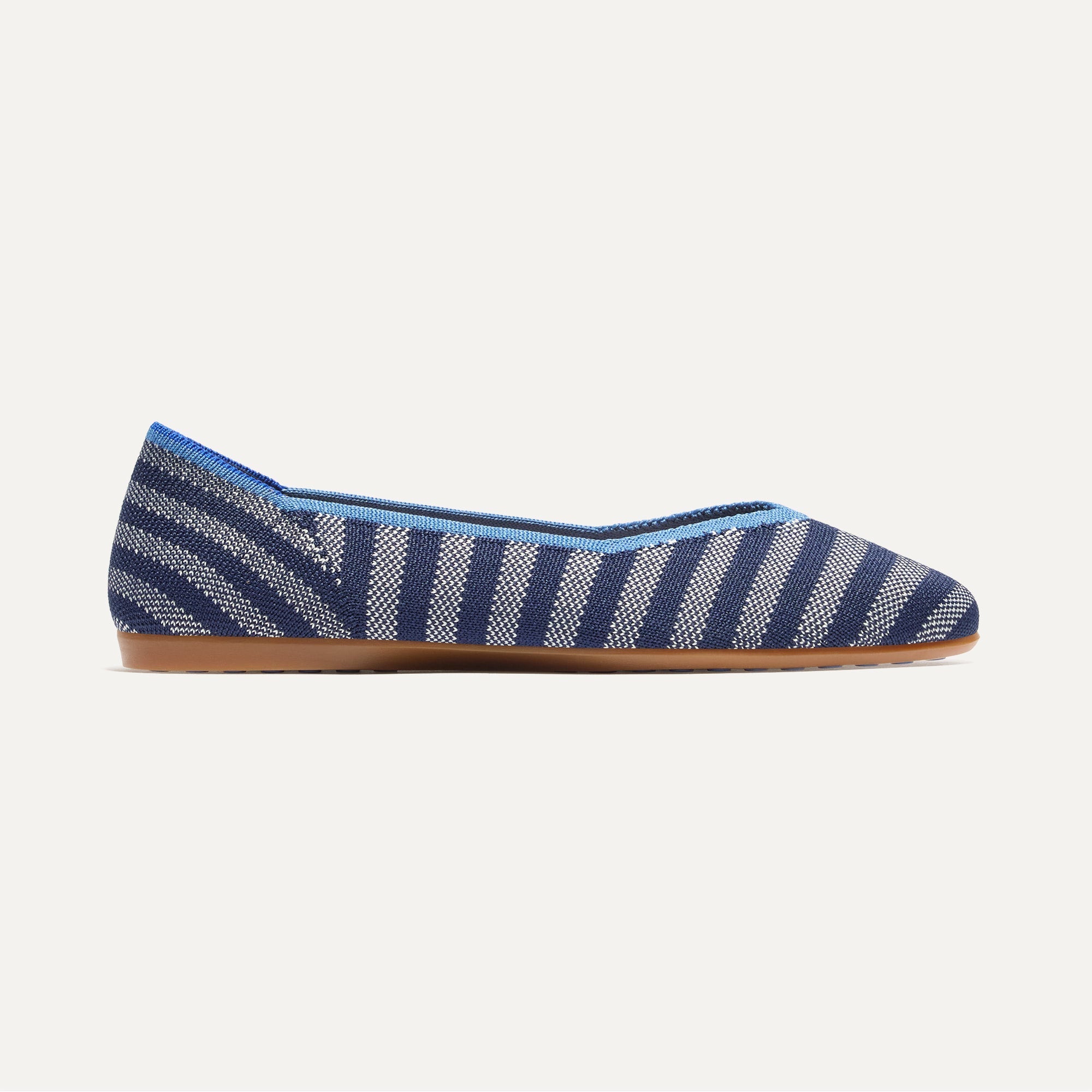 side | The Daily Flat in Harbor Cabana Stripe shown from the side. 