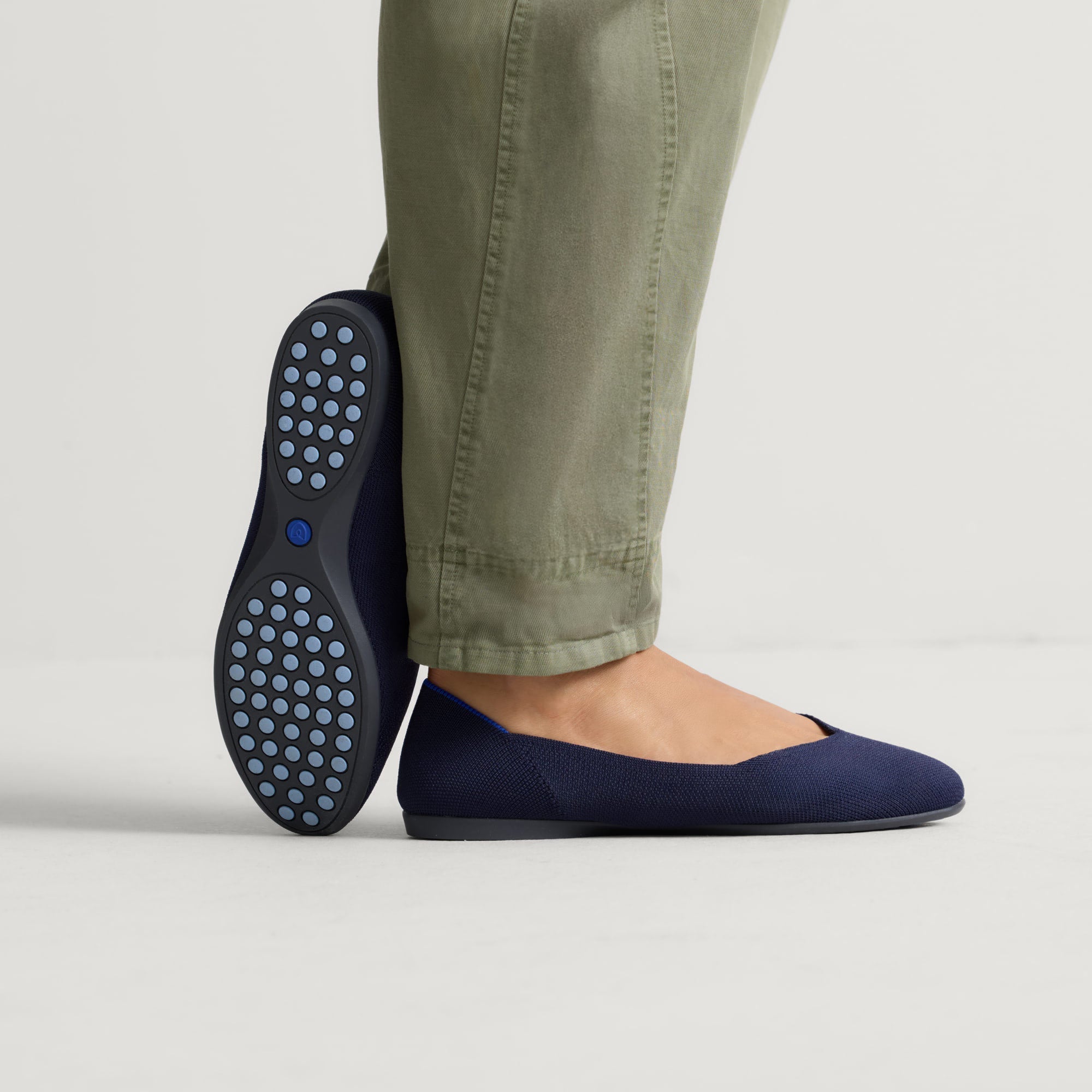 hover | Model wearing The Daily Flat in Navy. 