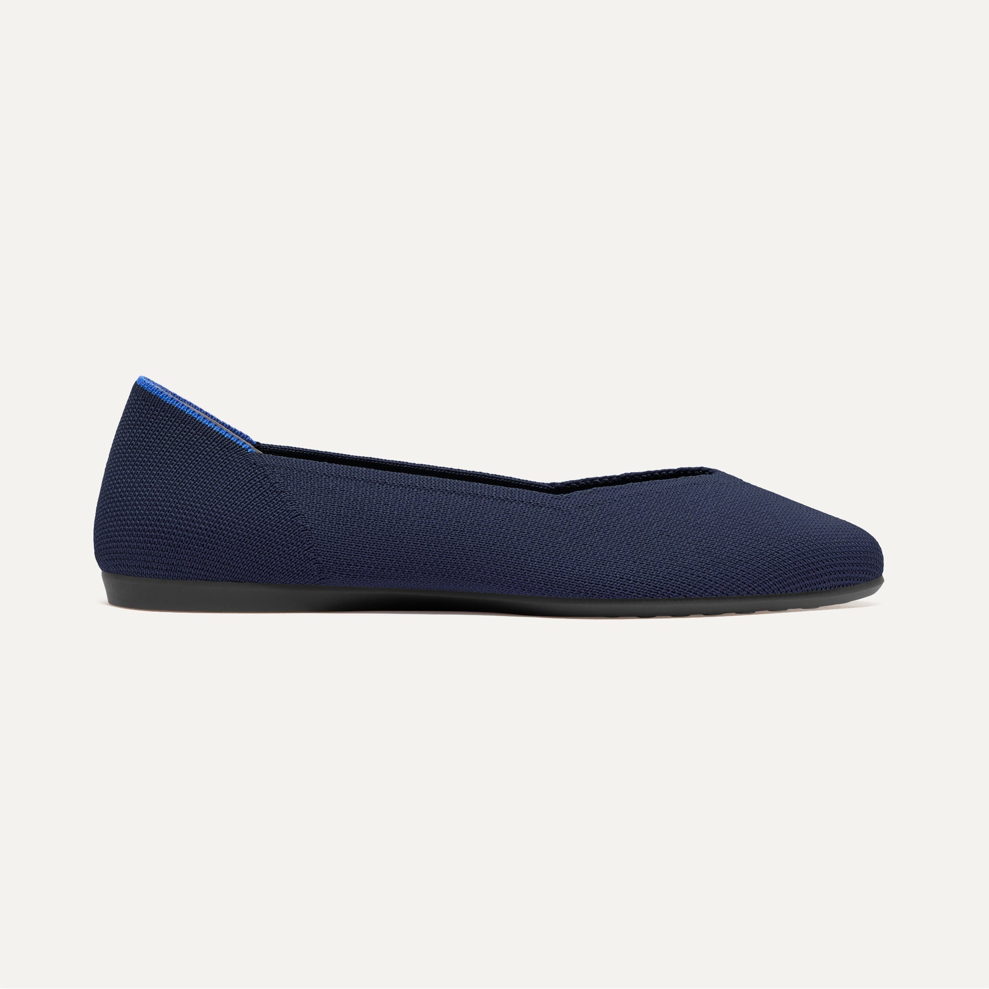 side | The Daily Flat in Navy shown from the side. 