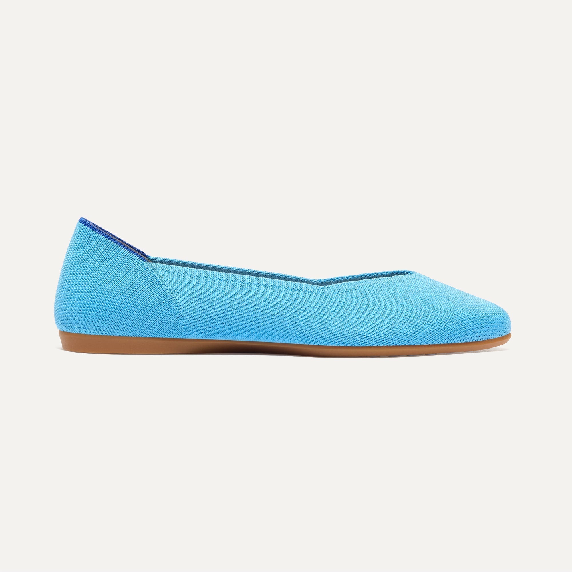 side | The Daily Flat in Robin Blue shown from the side. 