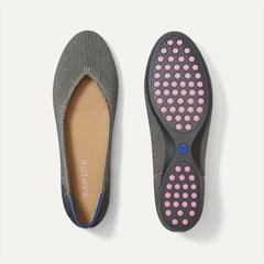 PLP |The Daily Flat in Salt Air shown from the top with one shoe showing the outsole. 