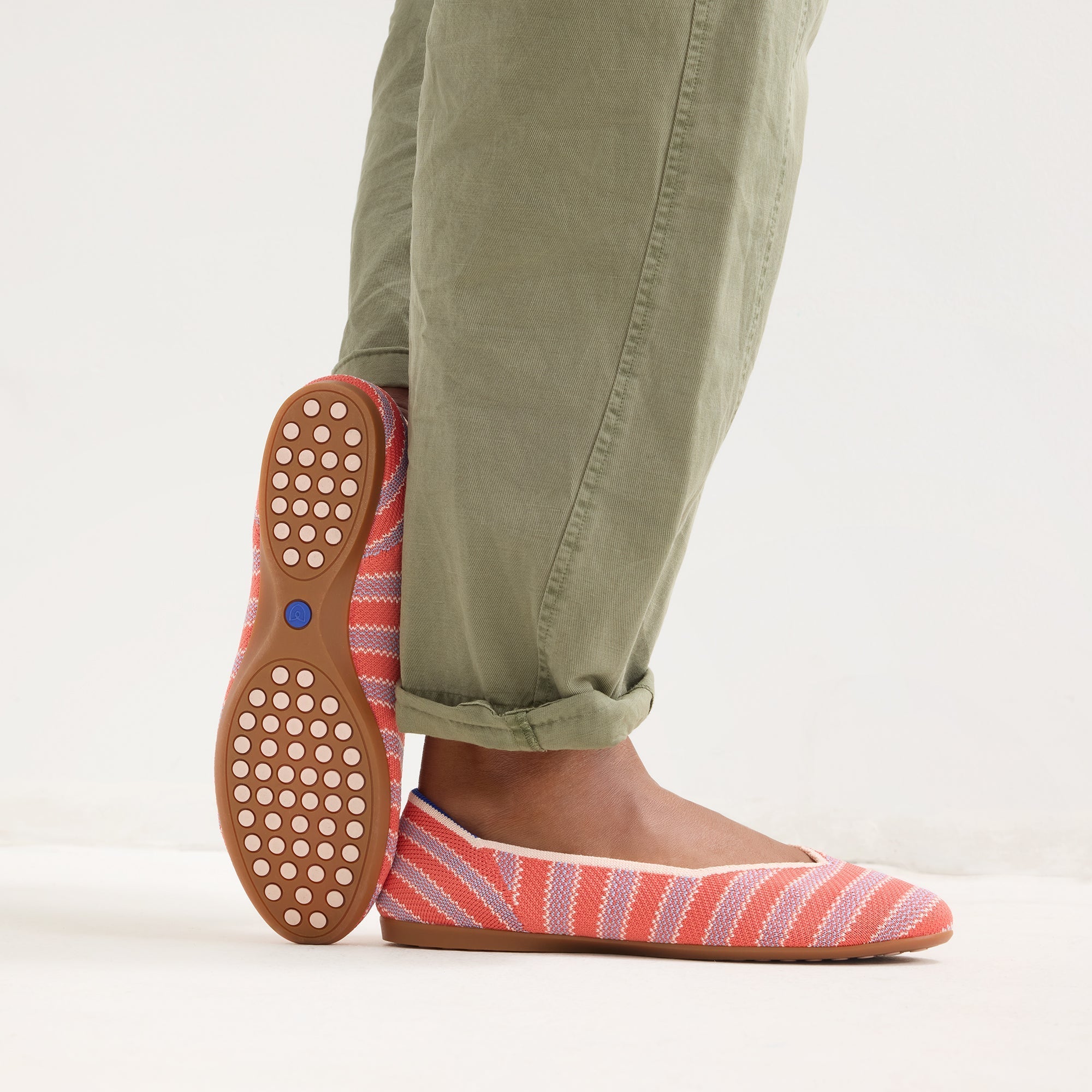 hover | Model wearing The Daily Flat in Sunkiss Stripe. 