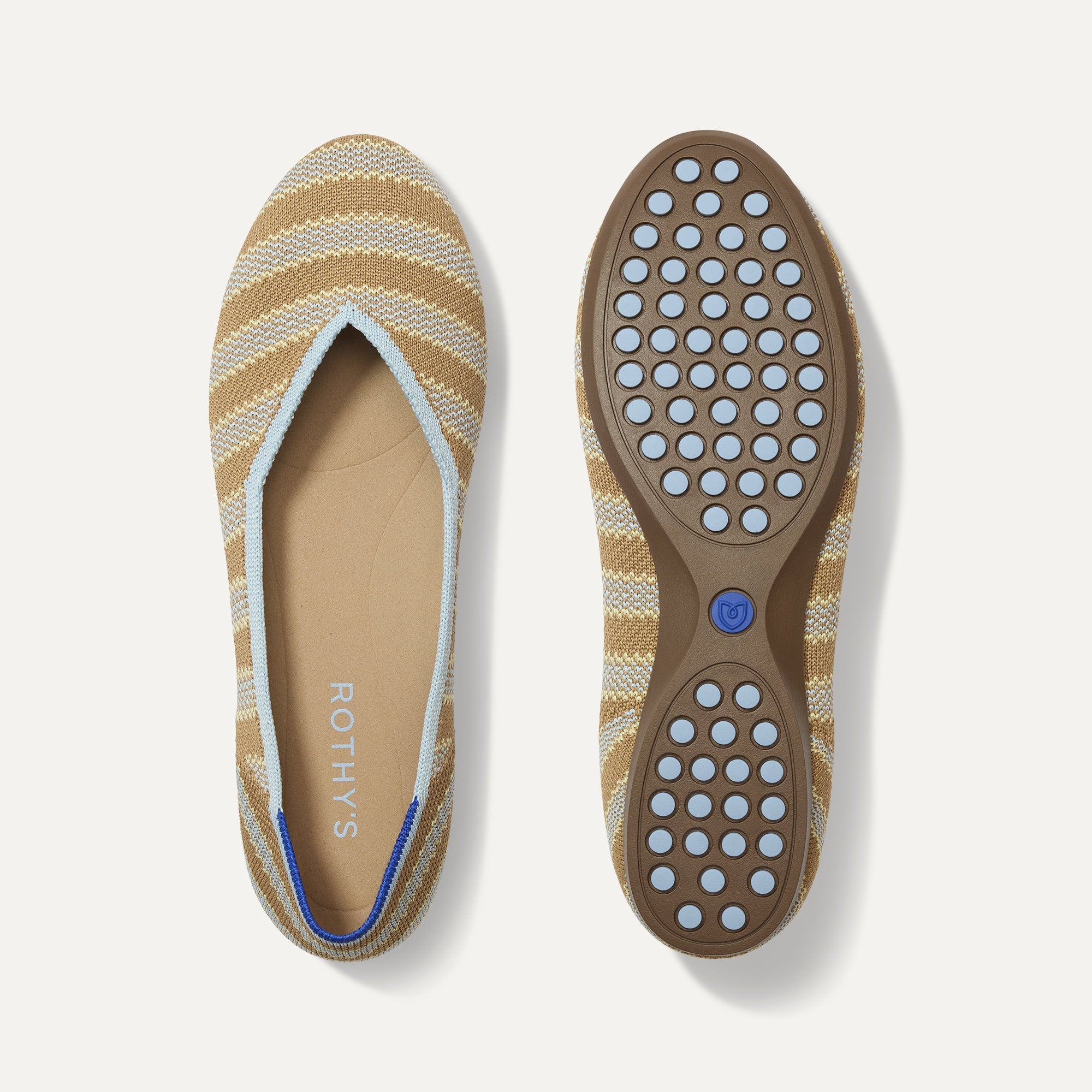 PLP |The Daily Flat in Terra Stripe shown from the top with one shoe showing the outsole. 
