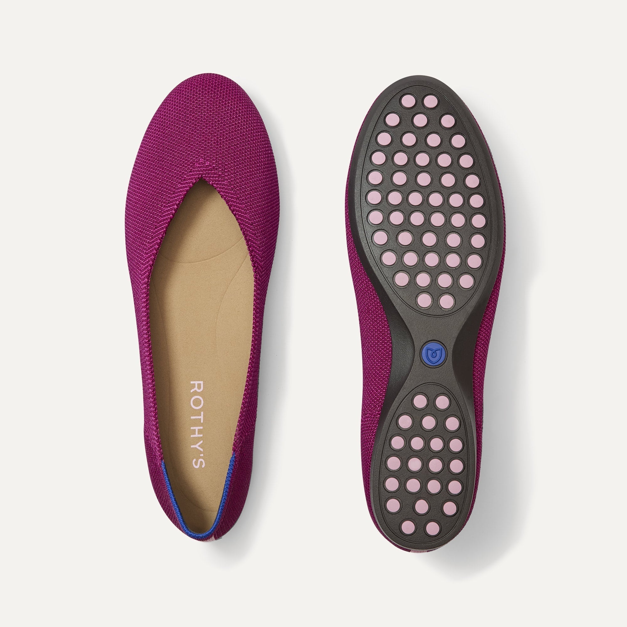 PLP |The Daily Flat in Wild Berry shown from the top with one shoe showing the outsole. 