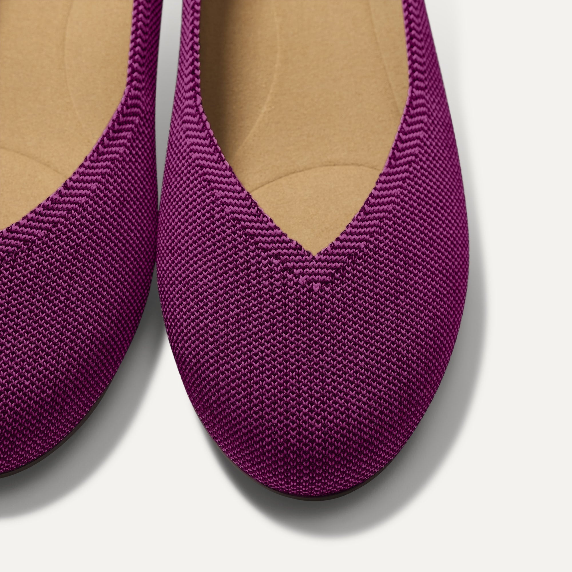 Close up of the toe and vamp of The Daily Flat in Wild Berry. 
