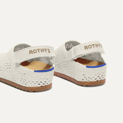 Close up of the back heel strap of The Kids Clog in White Crochet.