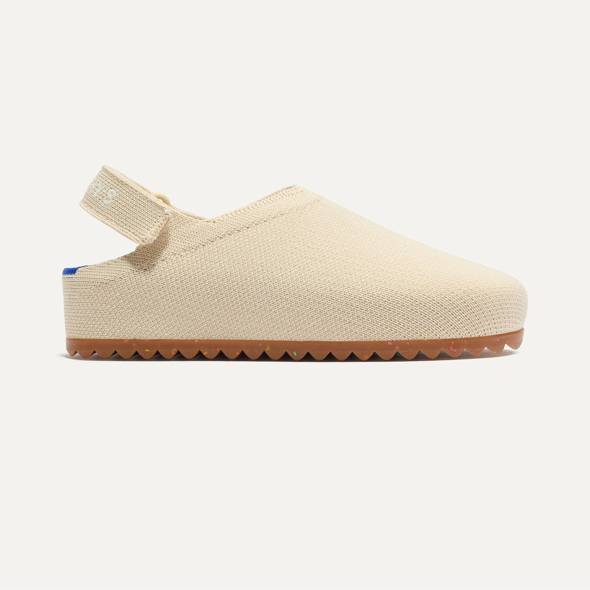 side | The Kids Clog in Conch shown from the side. 