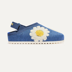 side | The Kids Clog in Indigo Daisy shown from the side. 