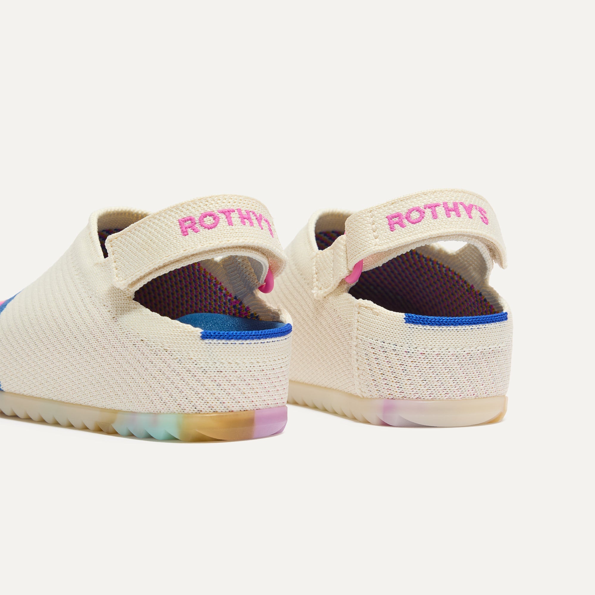 Close up of the heel of The Kids Clog in Retro Wave, with Rothy's signature blue halo. 
