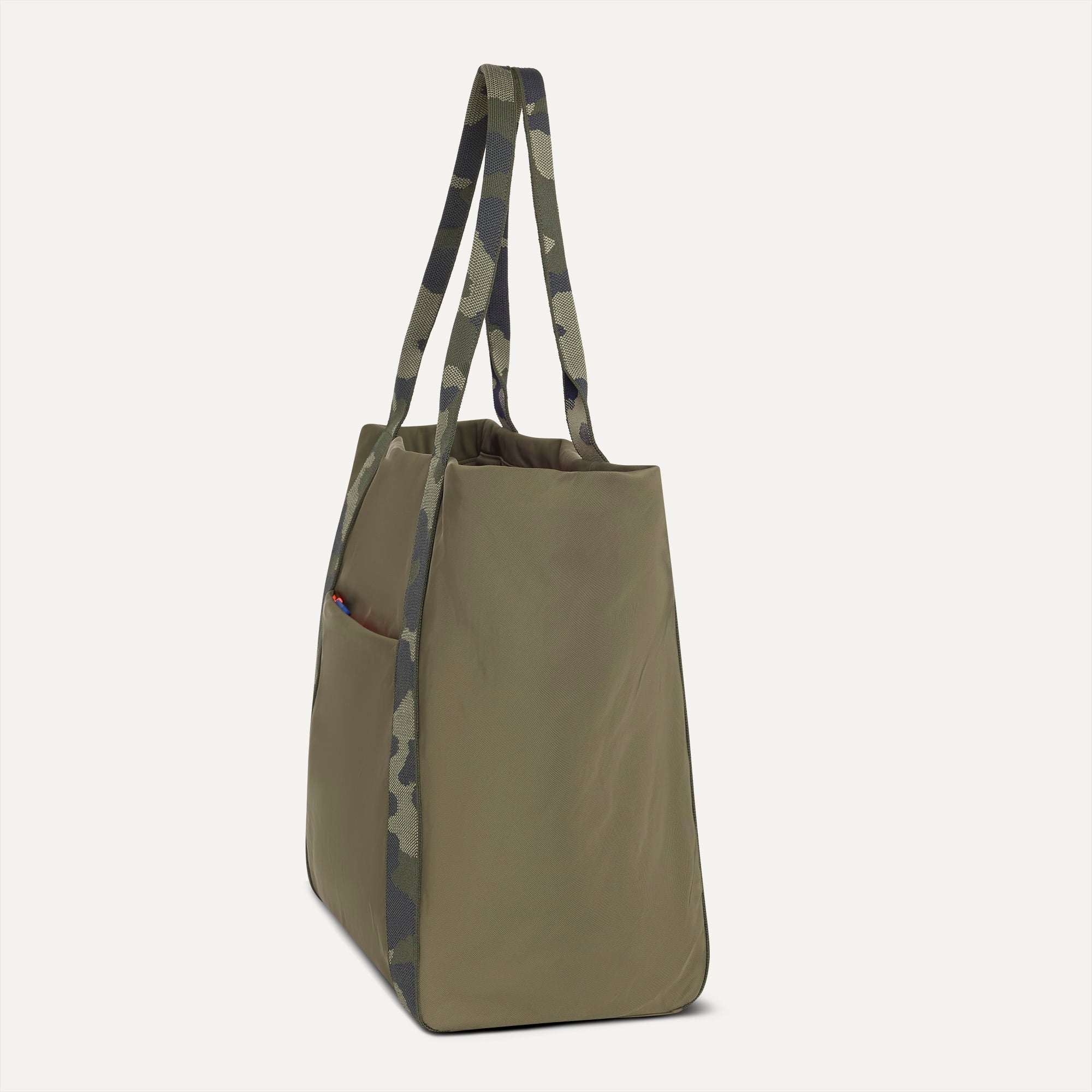 The Travel Tote in Forest shown from the side.