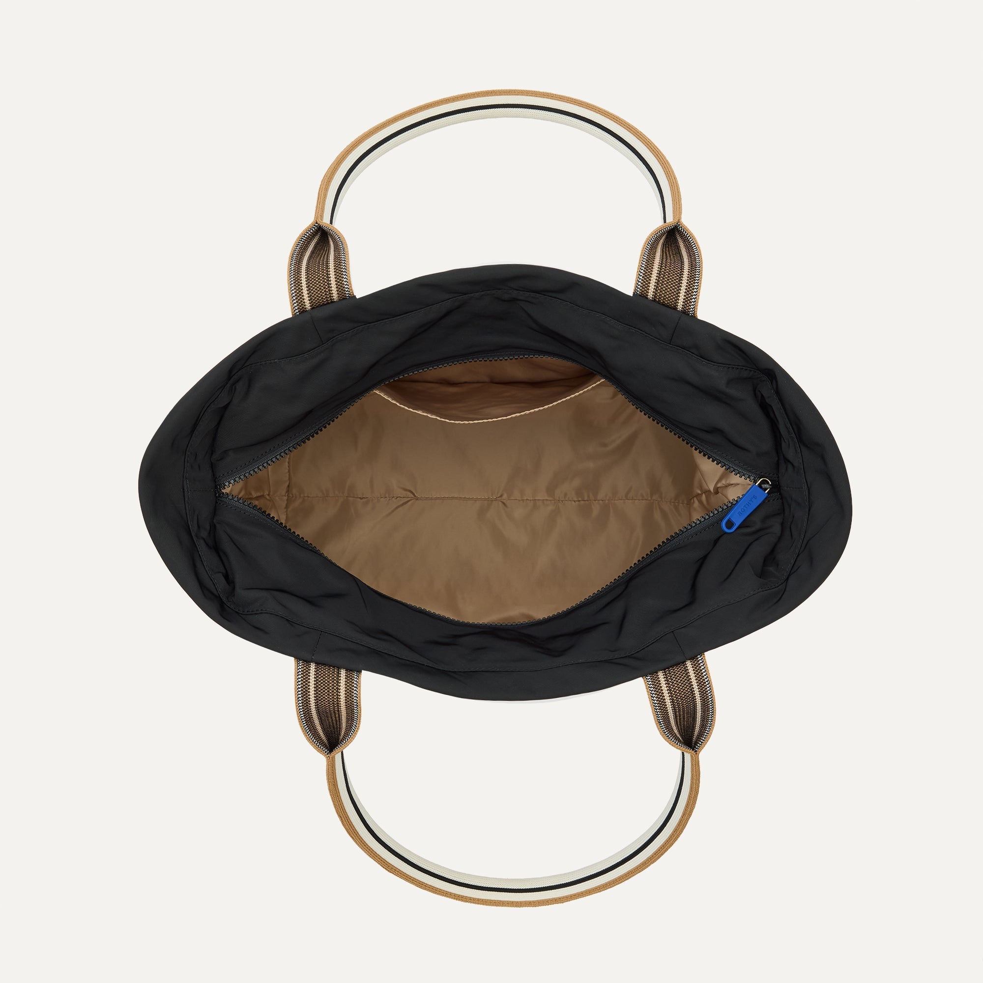 The Travel Tote in Ink, shown from above with the interior exposed.