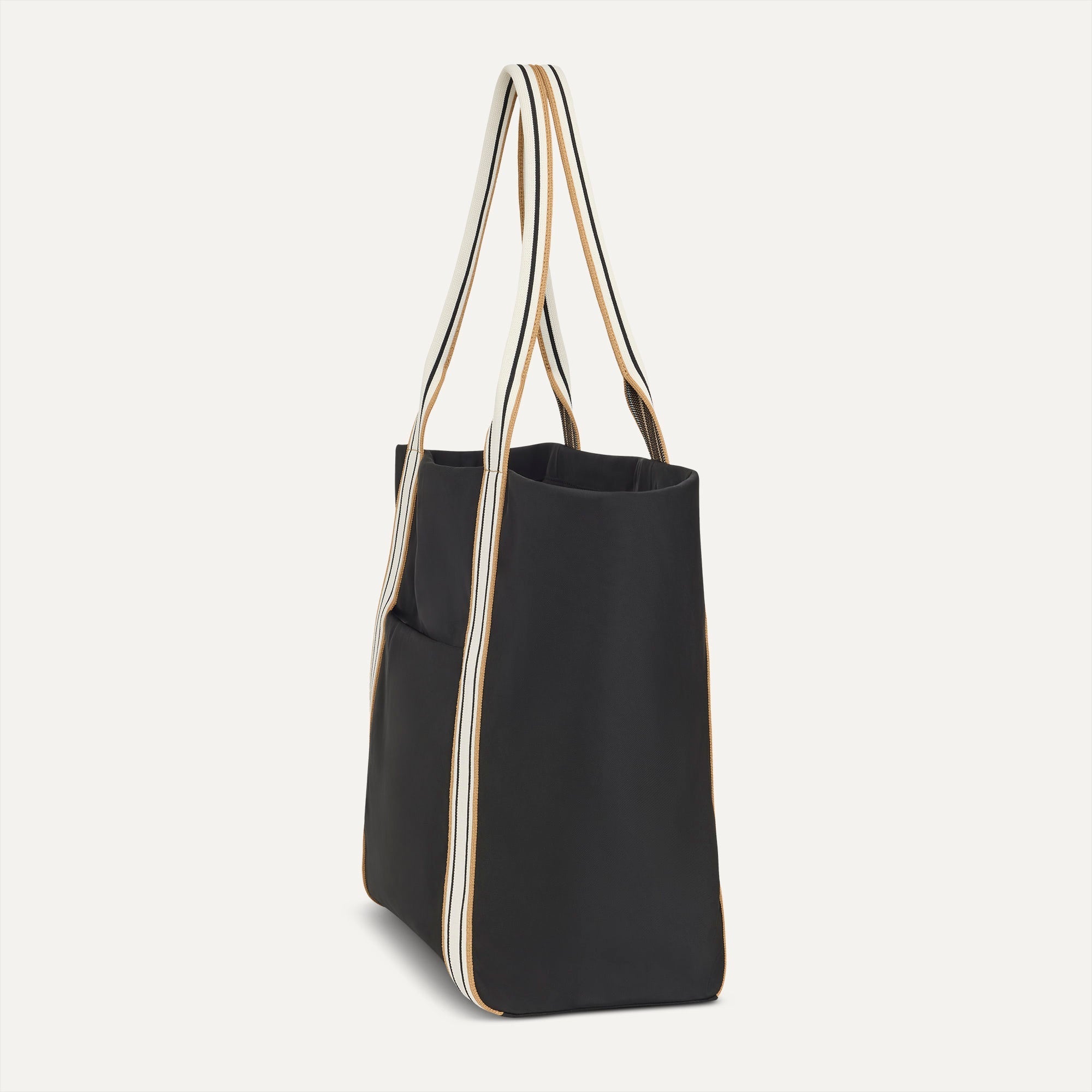 The Travel Tote in Ink shown from the side.