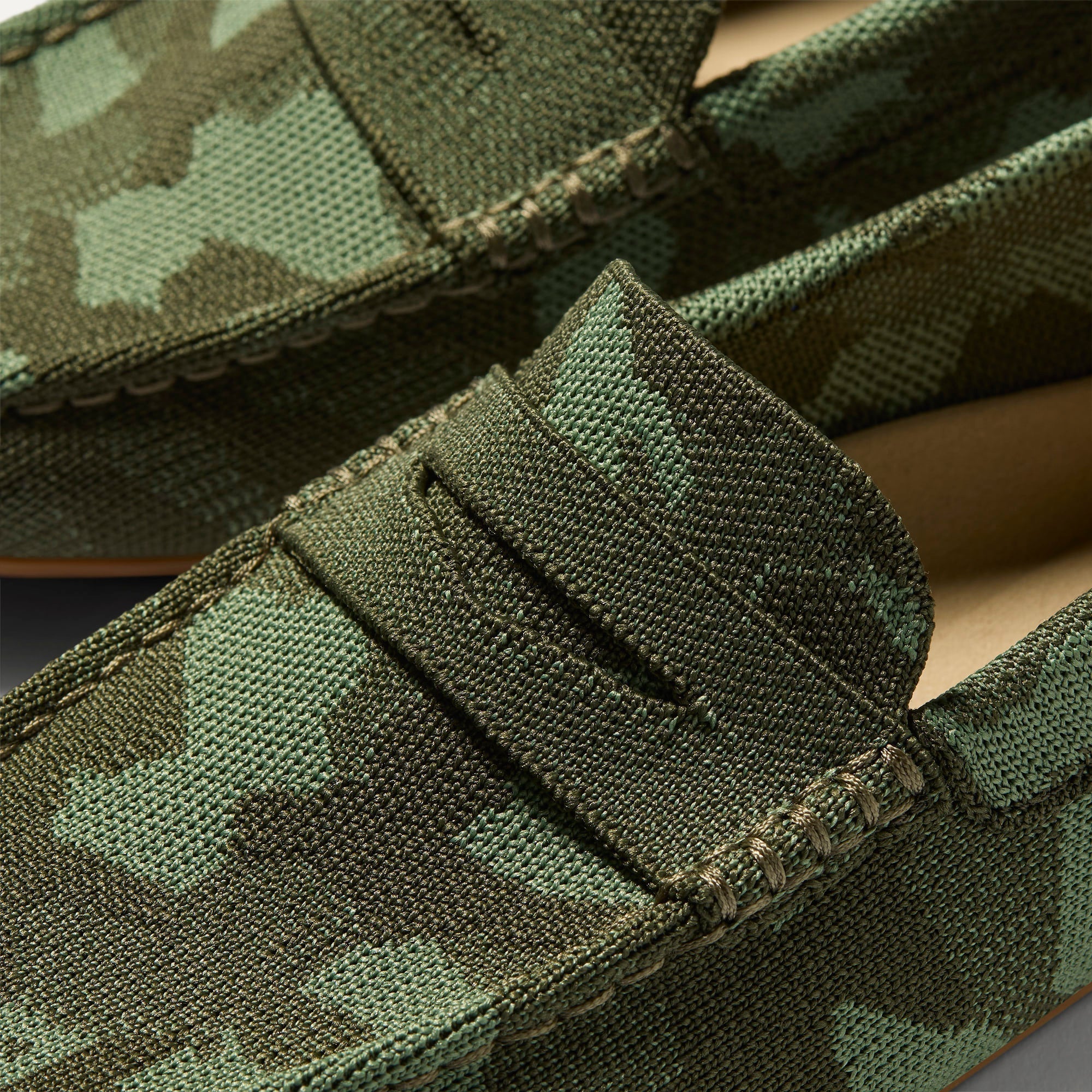 Close up of the toe and vamp of The Men's Daily Driver in Forest Camo. 
