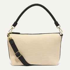 PDP |The Daily Crossbody Bag in Black and White Raffia-Knit shown from the front.