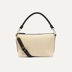 PLP |The Daily Crossbody Bag in Black and White Raffia-Knit shown from the front.
