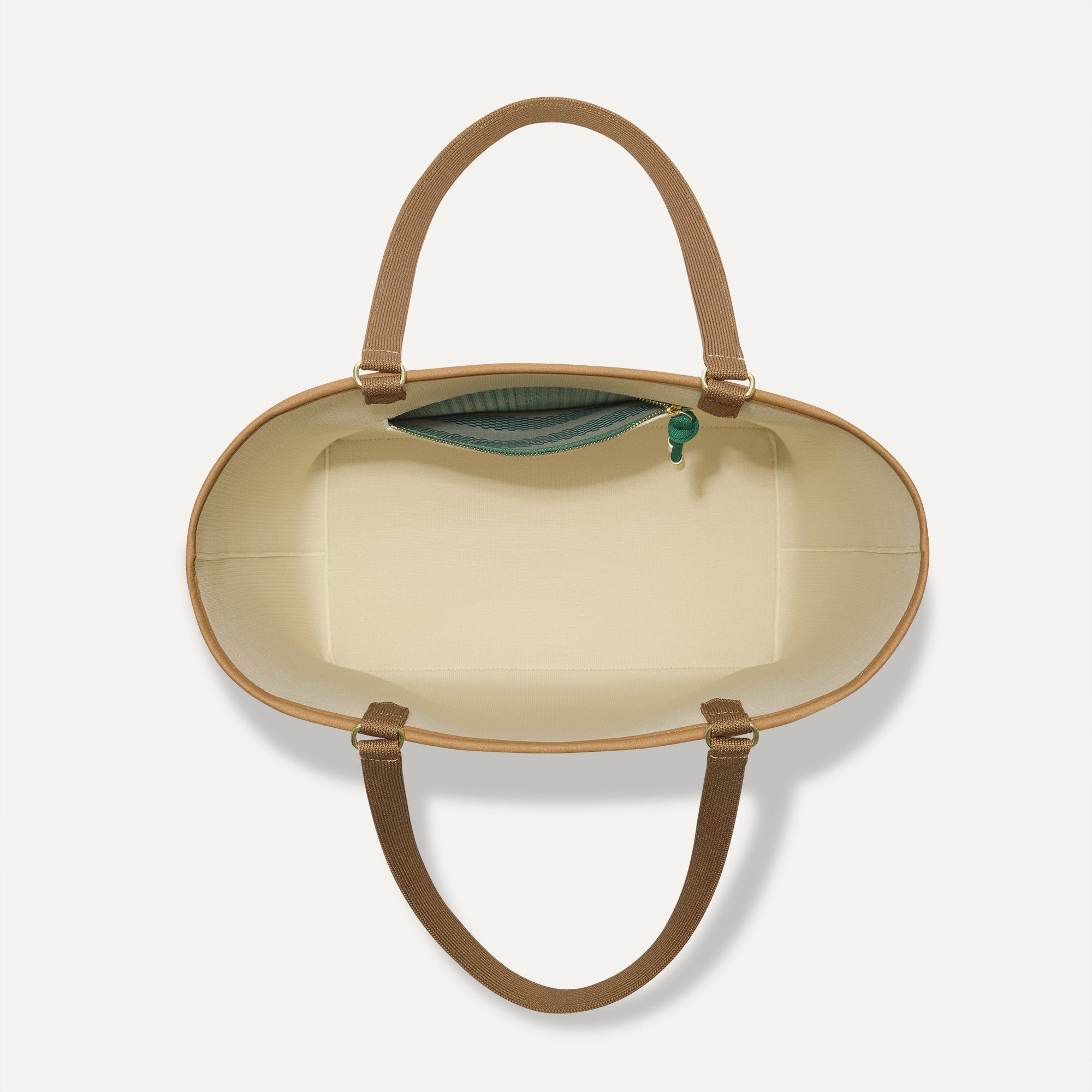The Two-Way Tote in Ivy, shown from above, with the reversible interior exposed.
