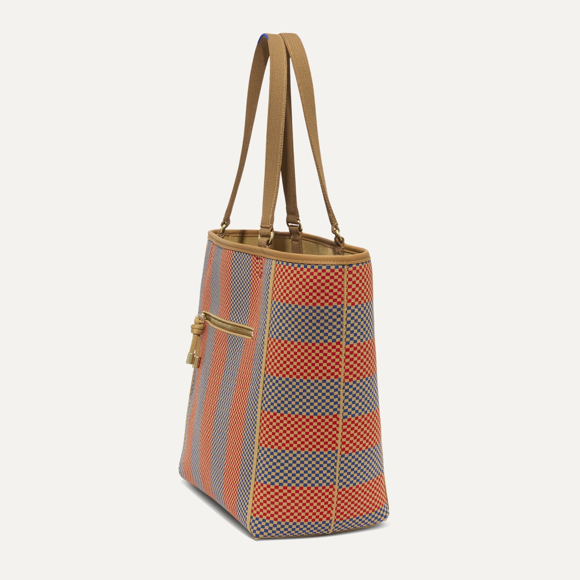 The Two-Way Tote in Sienna, shown from the side.