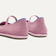 Close up of the heel of The Cruiser Mary Jane in ReVelvet™ Lilac, with Rothy's signature blue halo. 