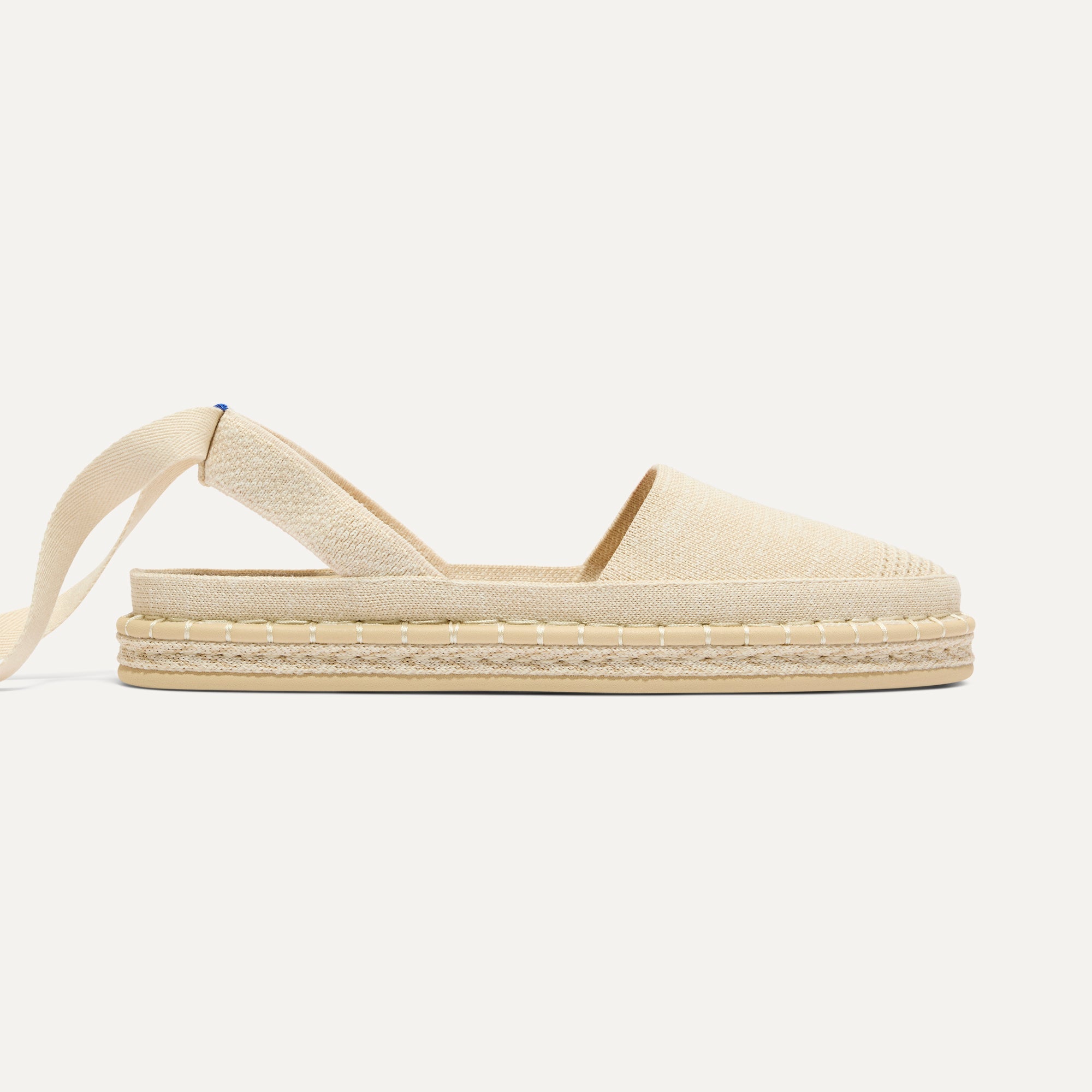 side | The D'Orsay Espadrille in Seashell, shown from the side.