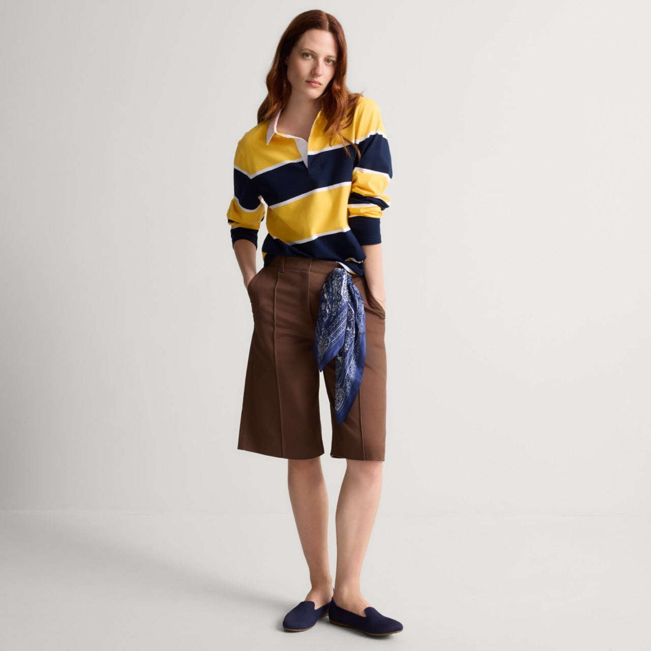 model | Alternate view of a model wearing The Daily Loafer in Navy. 