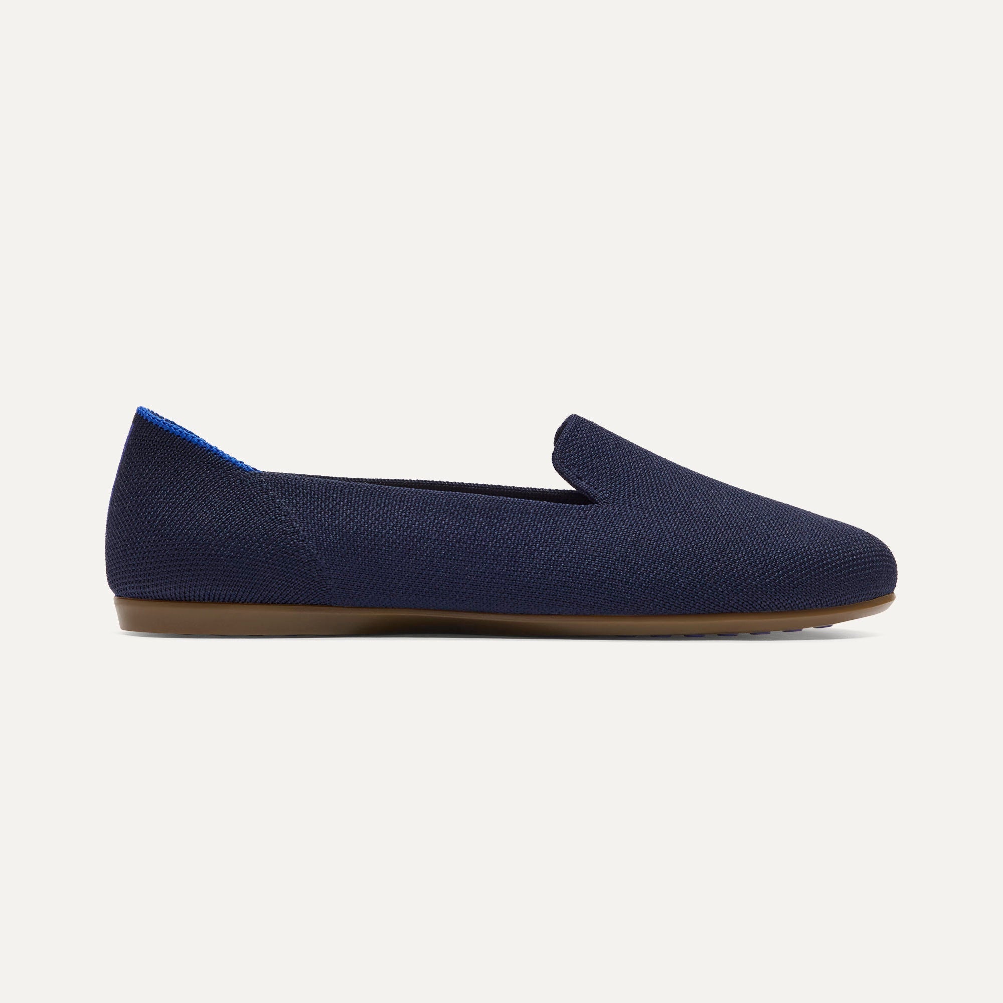side | The Daily Loafer in Navy shown from the side. 