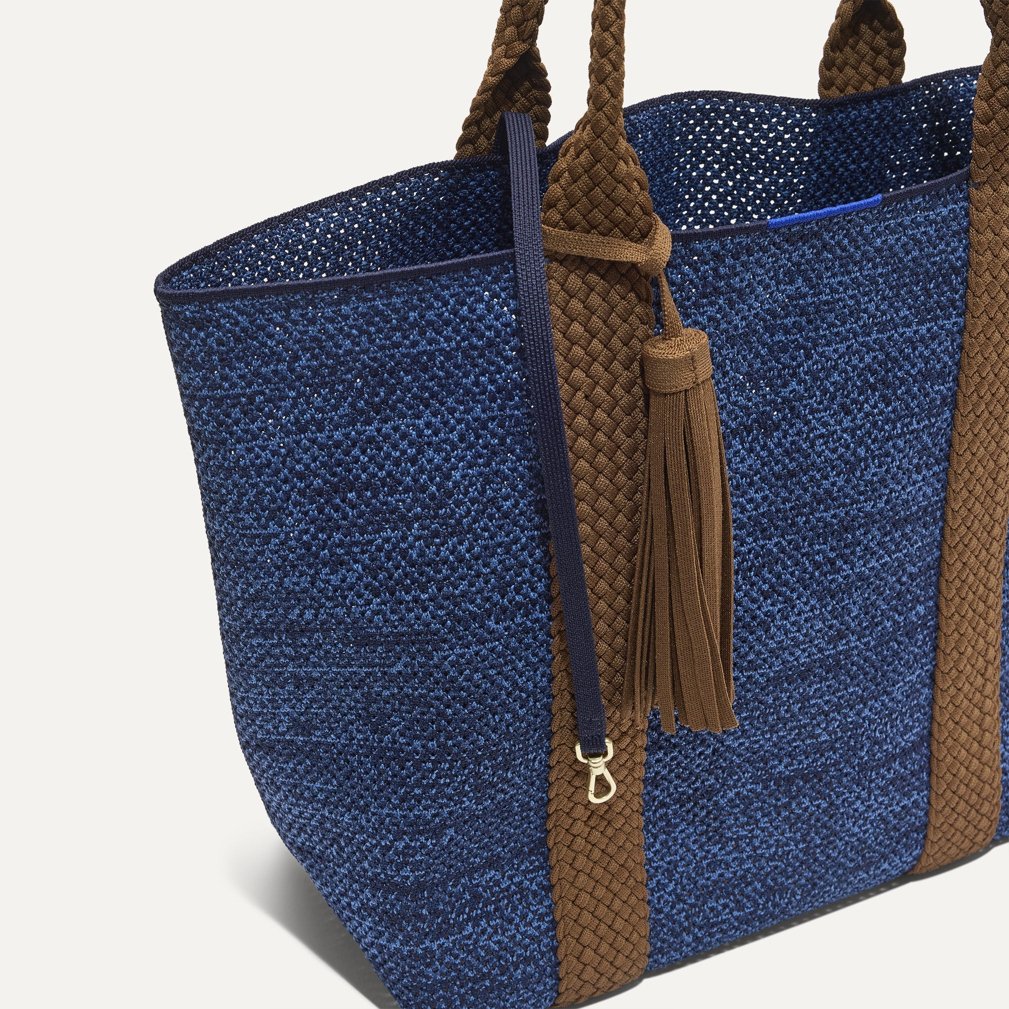 The Lightweight Tote in Dusk Open-Knit shown with its handy key leash. 