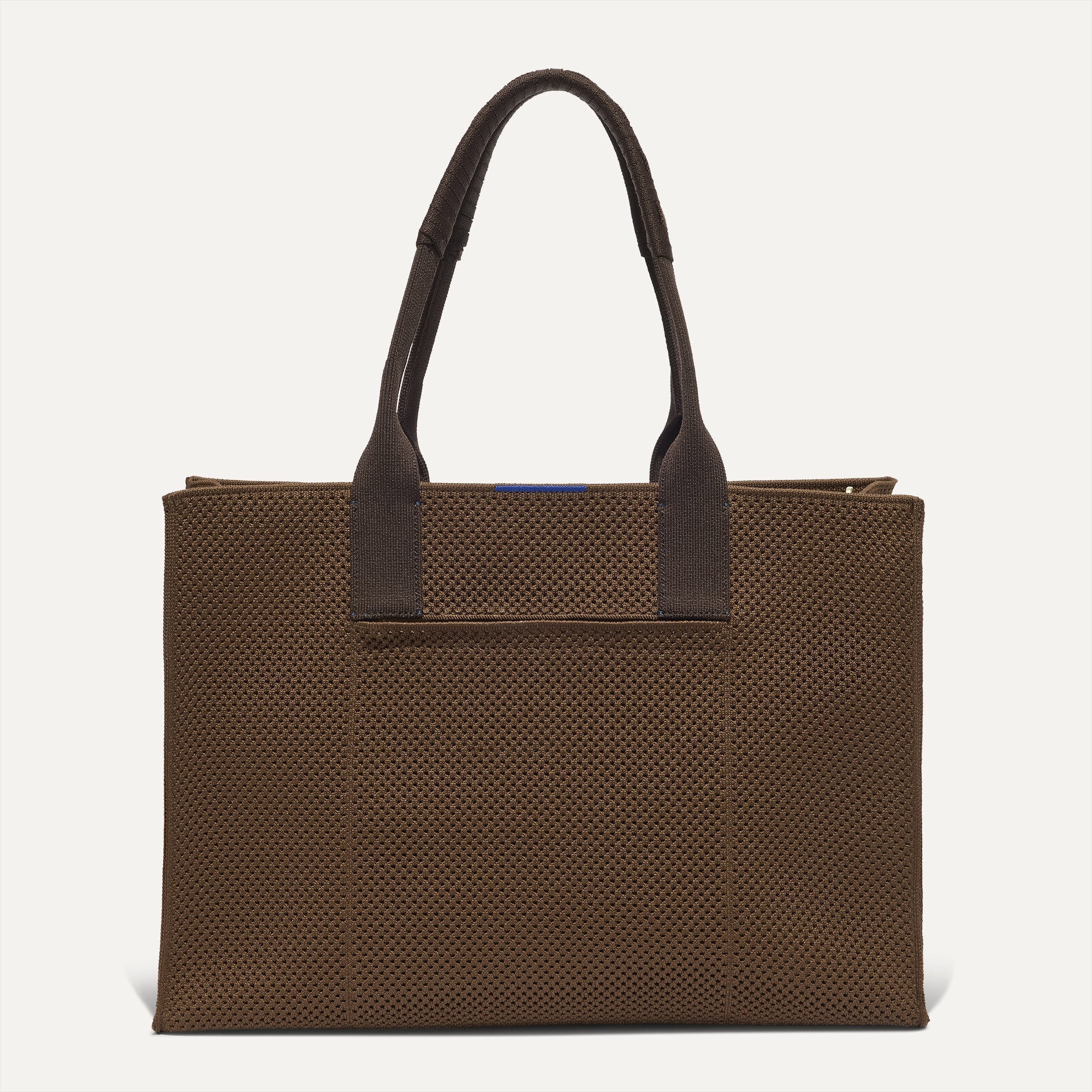 PLP |The Classic Tote in Cinnamon Open Knit, shown from the front. 