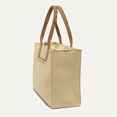 The Classic Tote in Macadamia Open-Knit, shown from the side.