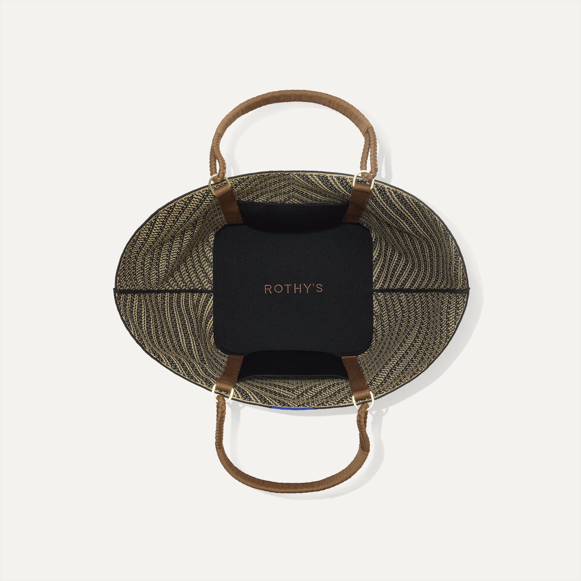 The Summer Tote in Toffee Chevron, shown from above with the interior exposed.