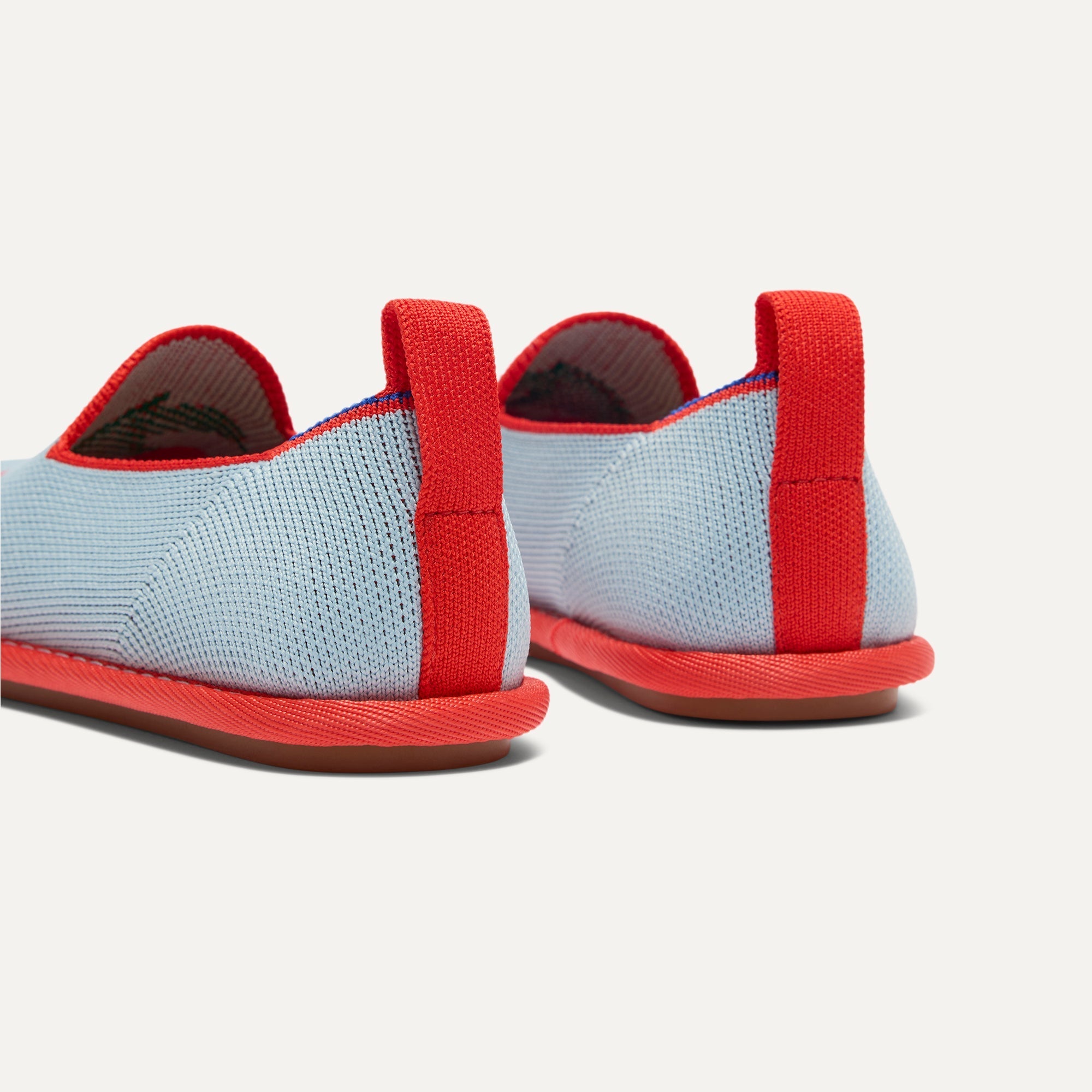 The Mini Loafer in Cherry Blue shown from the back view with the heel detail.