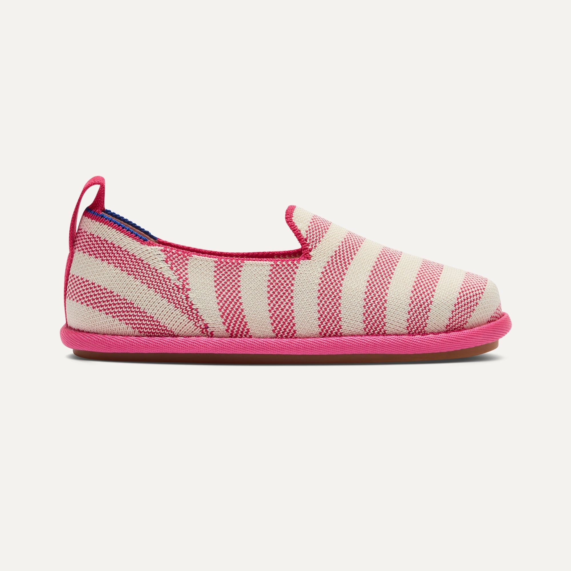 side | The Mini Loafer in Sorbet Stripe shown from a side view showing the outsole.