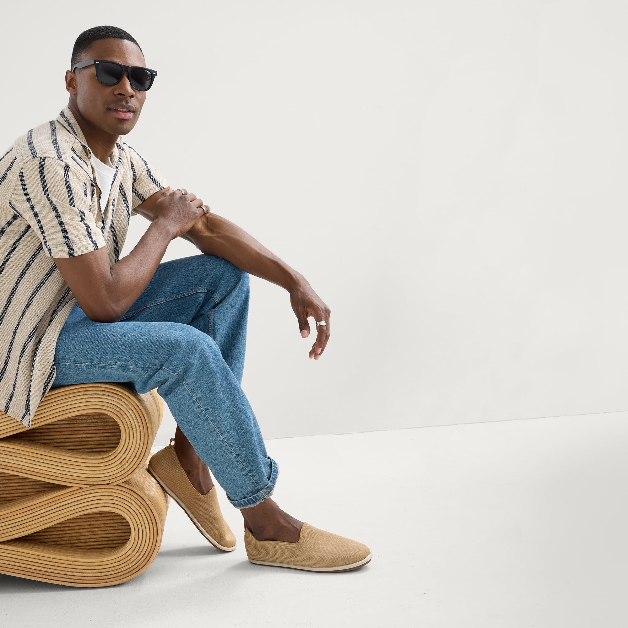 model | Alternate view of a model wearing The Men's Cruiser Loafer in Husk. 