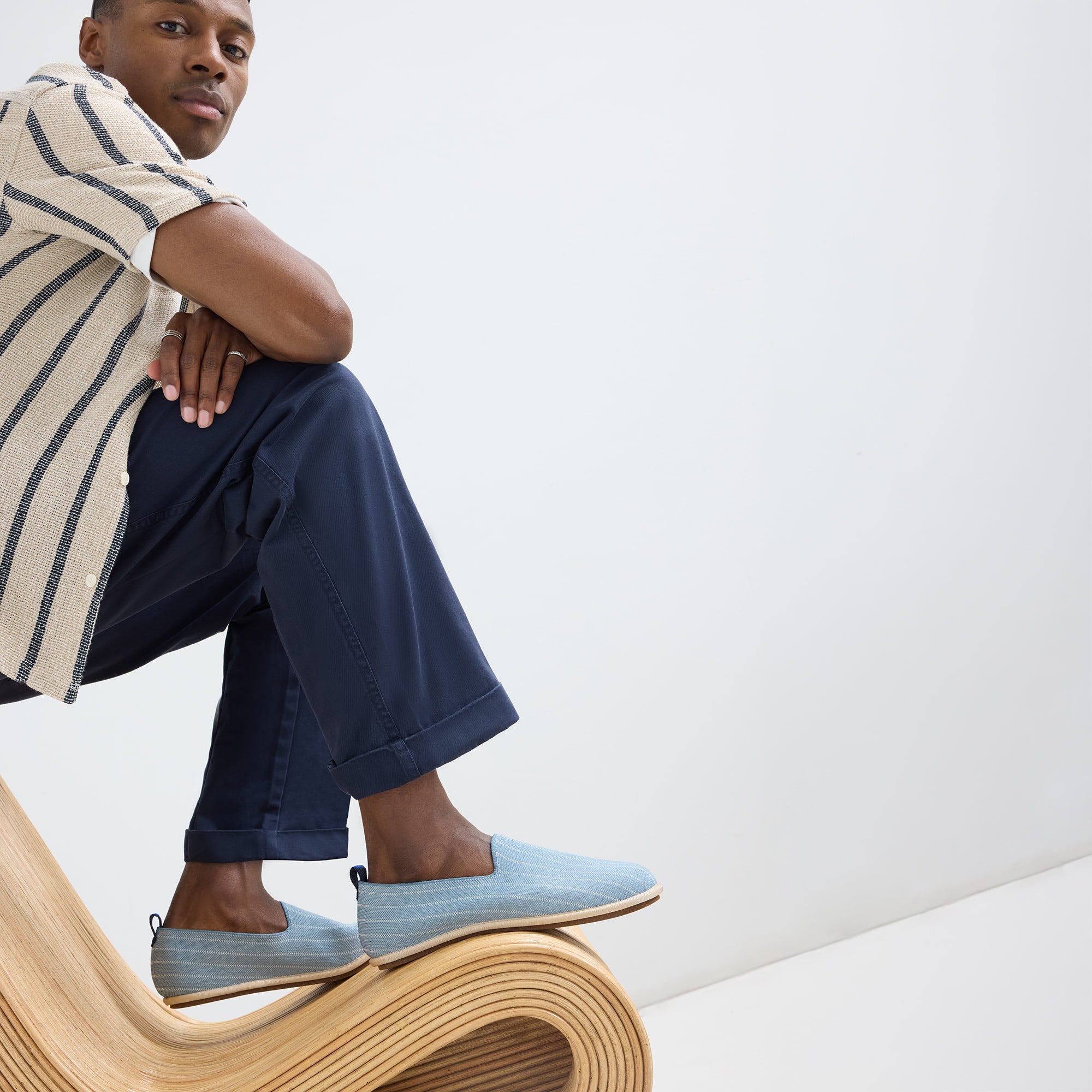 model | Alternate view of a model wearing The Men's Cruiser Loafer in Tidal Stripe. 