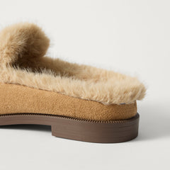 Close up of the heel of The Après Loafer Mule in ReVelvet Pecan.