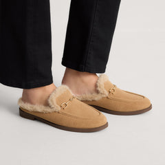 hover | Model wearing The Après Loafer Mule in ReVelvet Pecan.