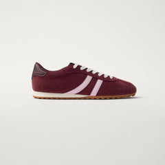 side | The Ivy Sneaker in ReVelvet Syrah shown from the side.