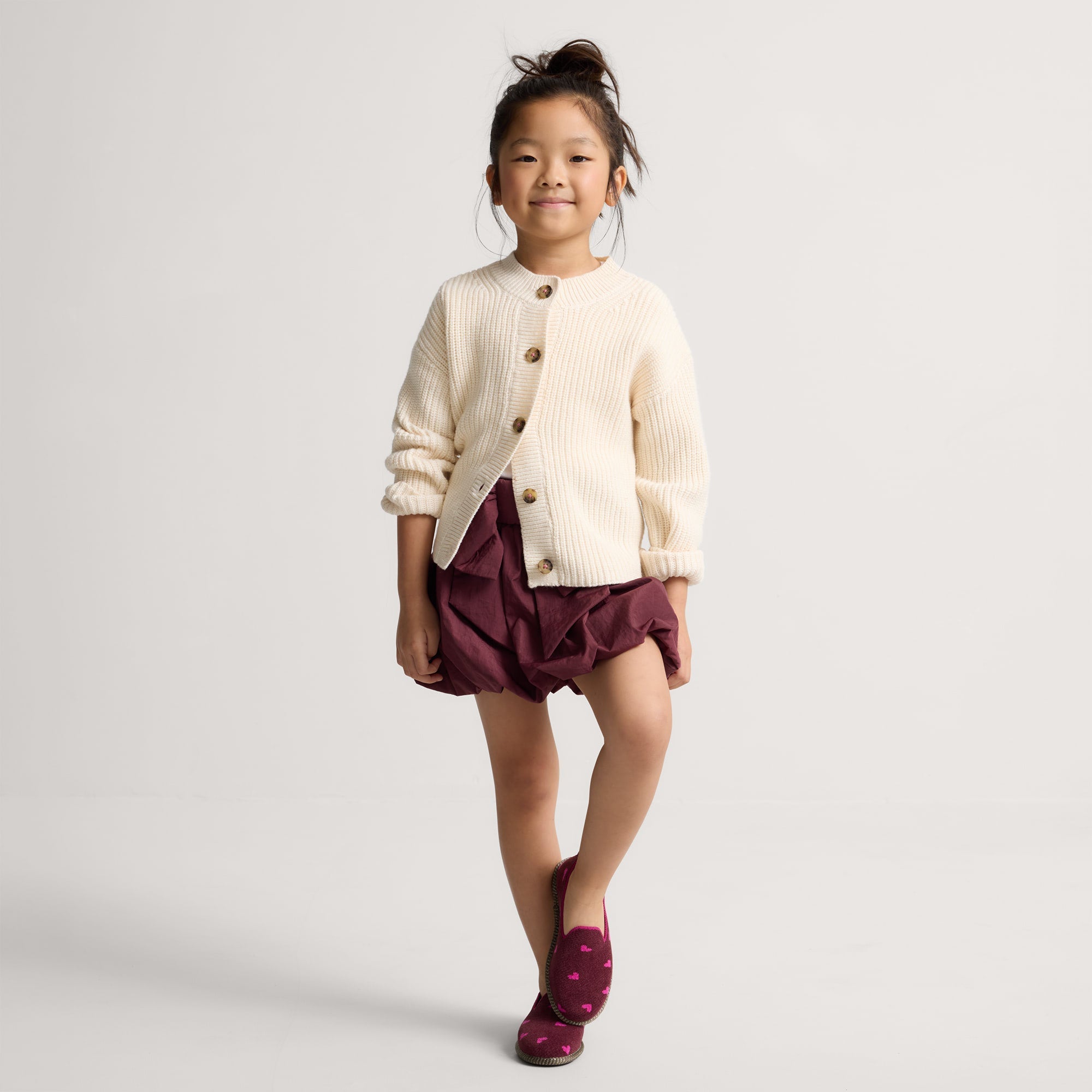 Alternate view of a model wearing The Mini Loafer in ReVelvet™ Heartbeat. 