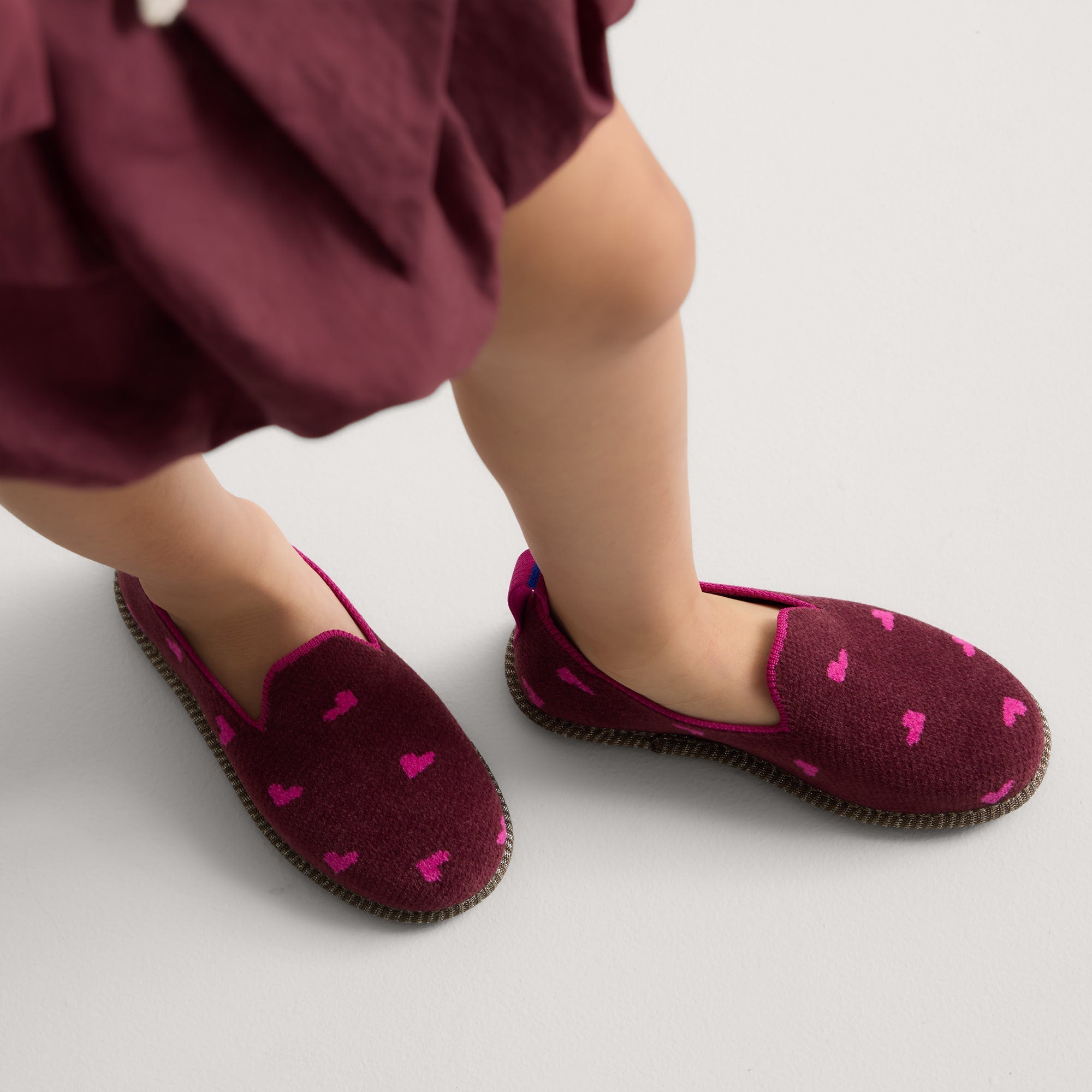 hover | Model wearing The Mini Loafer in ReVelvet™ Heartbeat. 