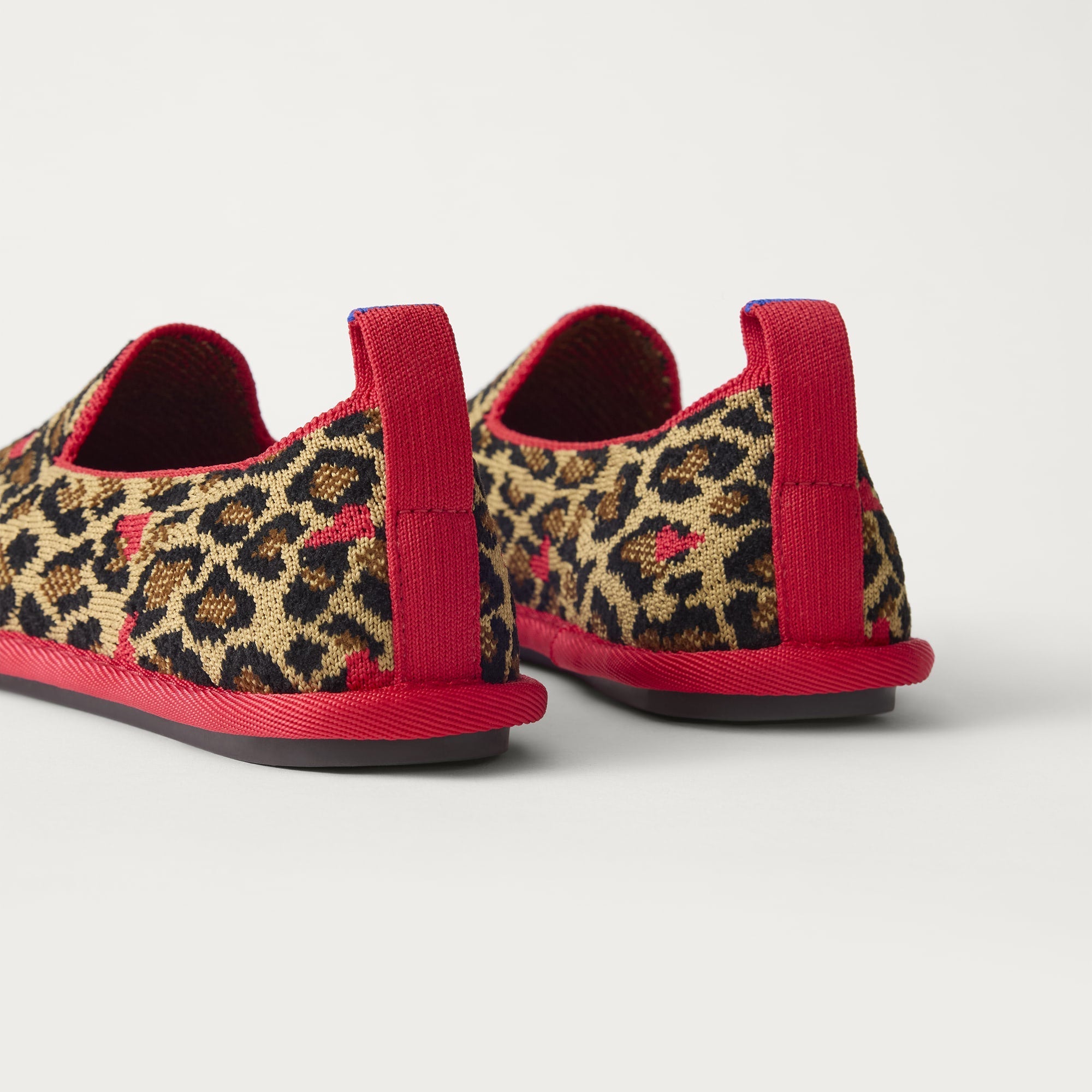 The Mini Loafer in ReVelvet™ Copycat shown from the back view with the heel detail.